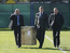 Представители УЕФА вносят Кубок на запасное поле стадиона "Сатурн"
